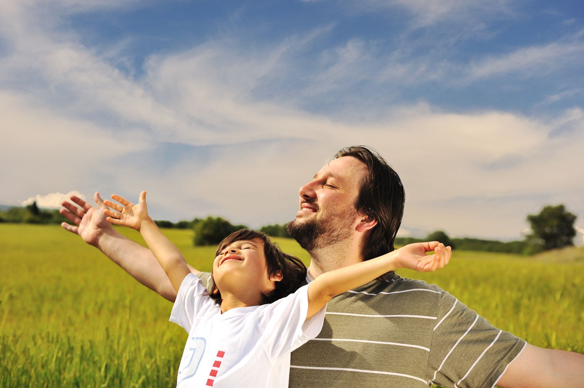 Happy, free father and son.